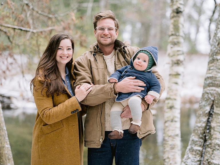 A family of 3 taking portraits in Northern Michigan