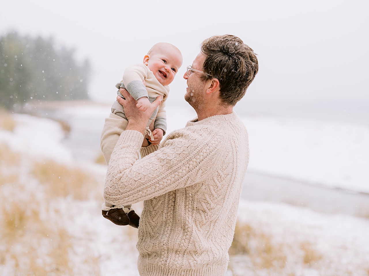 A father making his son laugh