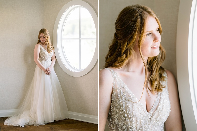 Portraits of a bride next to a circular window in Michigan.