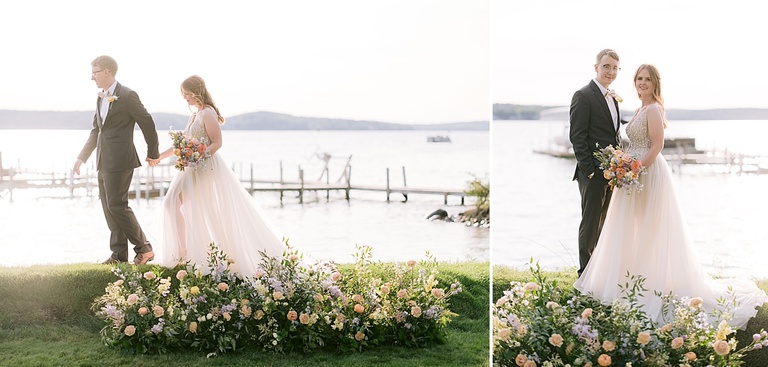 Golden hour portraits of bride and groom on a lake behind a beautiful floral ground piece.