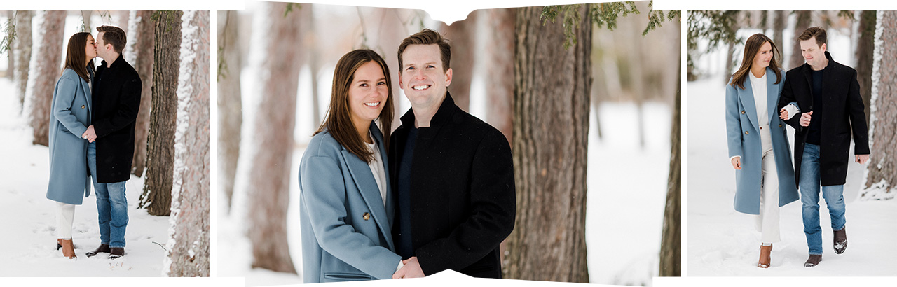 A couple under snowy covered trees taking portraits