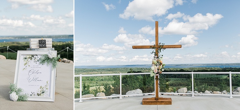 A wedding ceremony with a wooden cross that overlooks Grand Traverse Bay