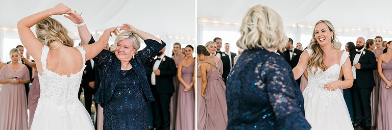 A bride having fun and smiling while dancing with her mother at the reception