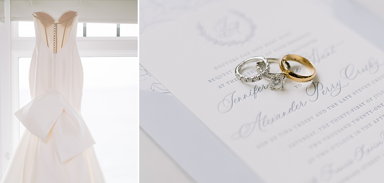 A bride’s gown hanging in a window and a photo of a bride and grooms rings