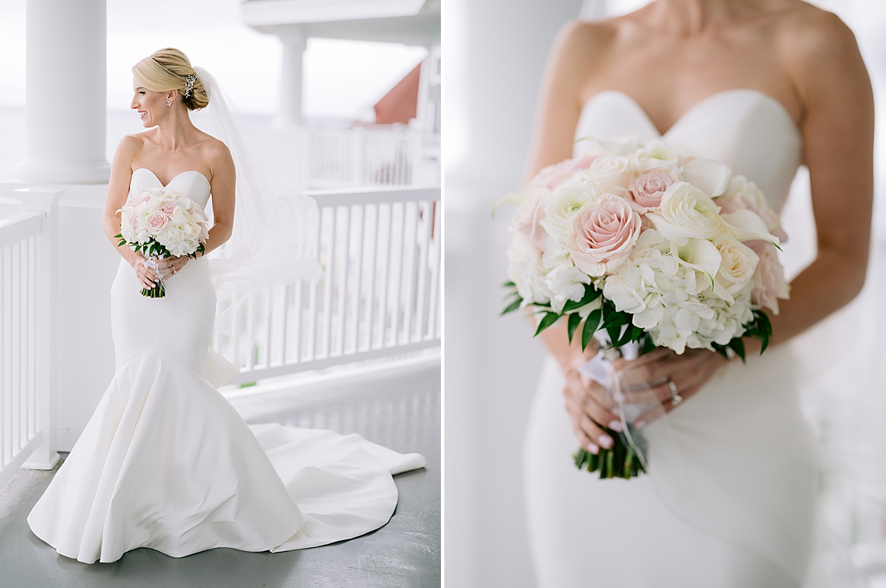 A portrait of a bride in her gown and veil holding a bouquet of pink and white roses