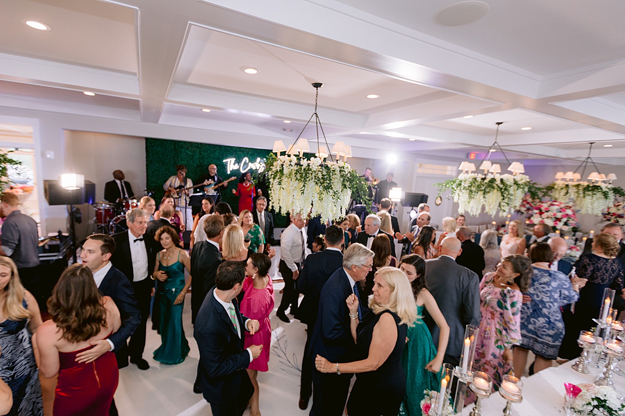 A photo of a wedding reception dance floor with a band playing in the background