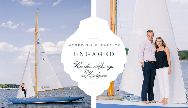 An engaged couple on a sailboat in Little Traverse Bay taking portraits