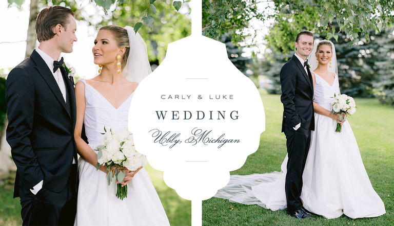 A bride and groom taking portraits on green grass by a birch tree