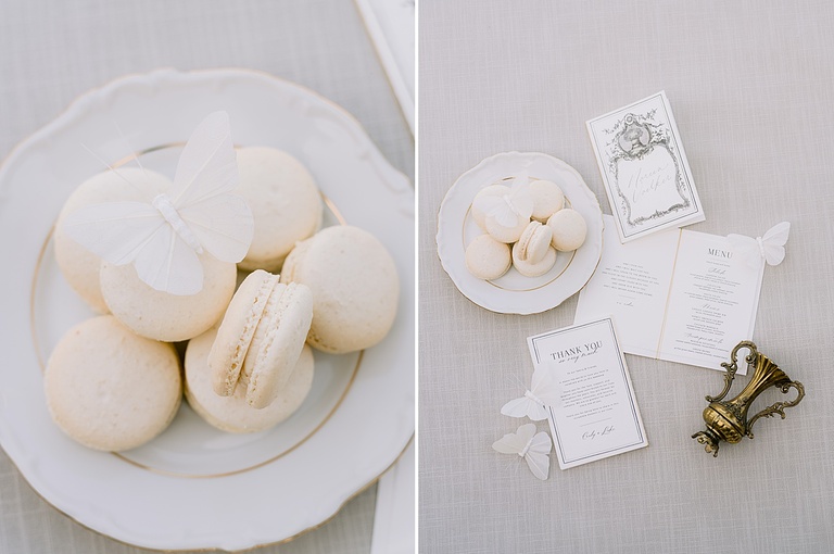 A flatlay of white macaroons, thank you card, and menu