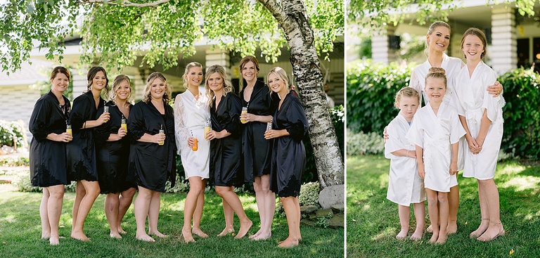 A bride taking portraits with her bridesmaids in matching robes on a sunny day in Michigan