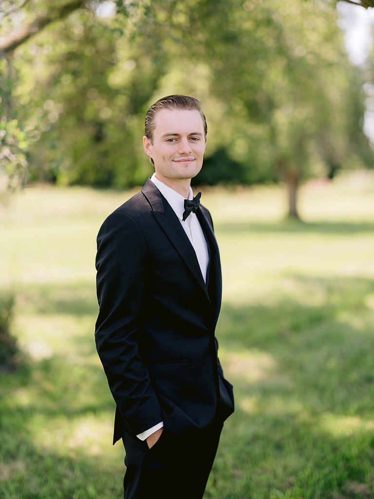 Groom portraits on a sunny, summer day in Michigan