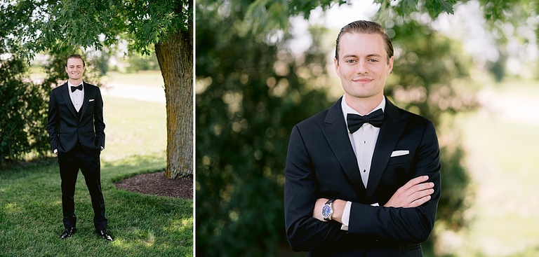 A groom taking portraits in a black tux from Men's Wearhouse