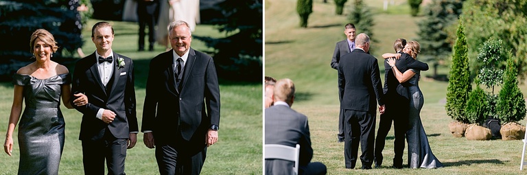A groom walking down the ceremony aisle with his mother and father in Michigan