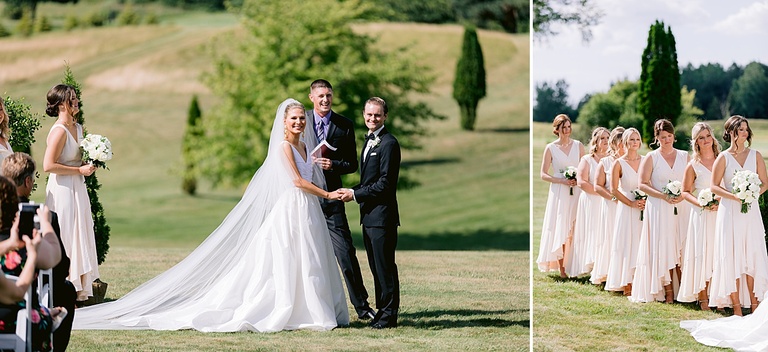 A bride and groom smiling at all their guests