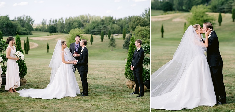 A bride and groom kissing at the ceremony