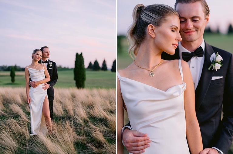 A bride wearing a satin dress with a slit and groom wearing a black tux