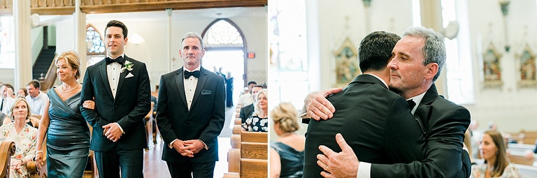 A groom walking down the aisle in a church with his parents in Petoskey