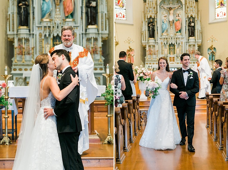 A bride and groom sharing their first kiss at the alter in a Catholic Church in Michigan