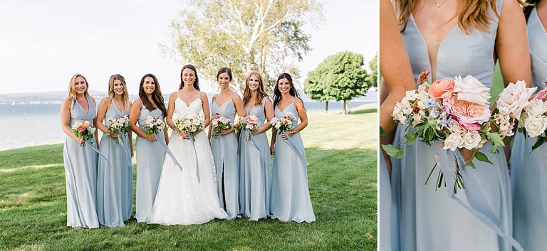 The bride and bridesmaids taking portraits with blue bridesmaids dresses and pink florals