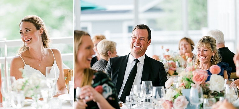 The parents of the bride laughing at speeches at their daughters wedding