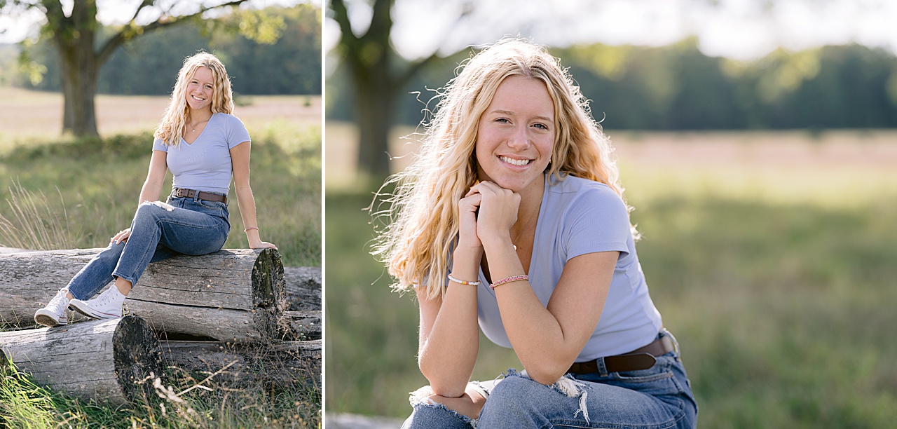 Michigan high school senior portraits of a girl sitting on a log in Michigan summer