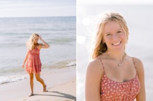 A high school senior poses near the water of a Michigan Lake in August