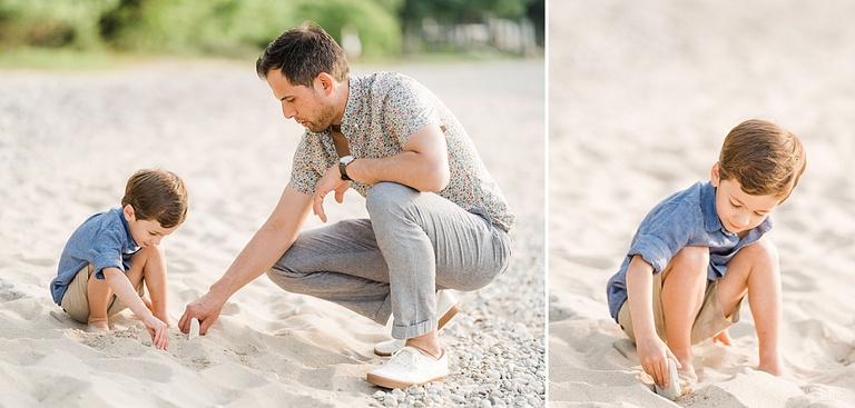 A father and son play in the sand of a Northern Michigan beach together in the sun