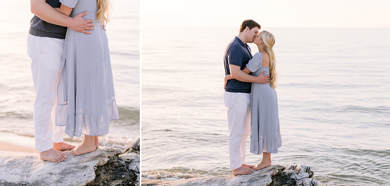 A couple kissing with a calm Lake Michigan in the background