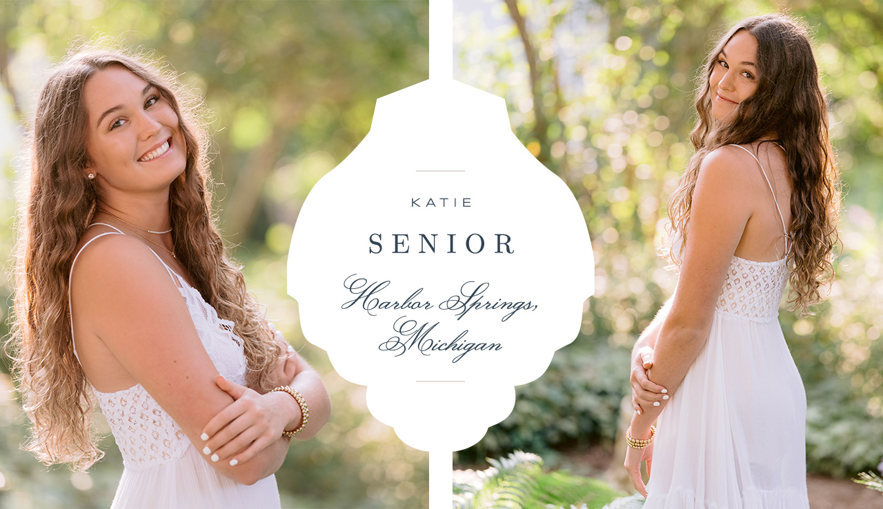 A high school girl poses in a white dress for Harbor Springs Senior Portraits