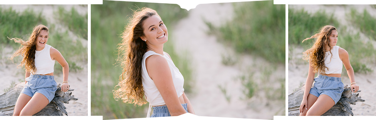 A brunette girl with long, curly hair poses for harbor springs senior portraits