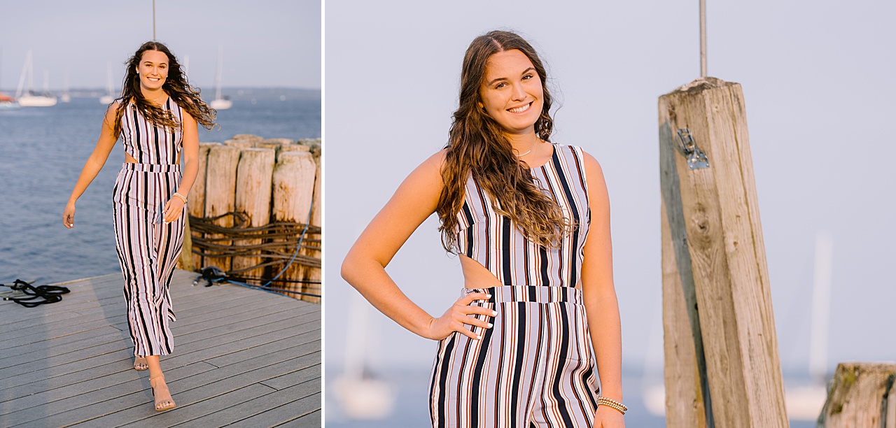 A girl with long brown hair walks up a dock in harbor springs michigan