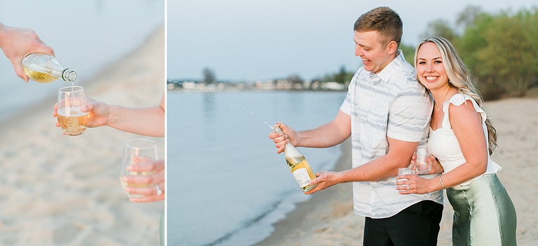 Photos of a couple popping open a bottle of sparkling on the beach in northern michigan