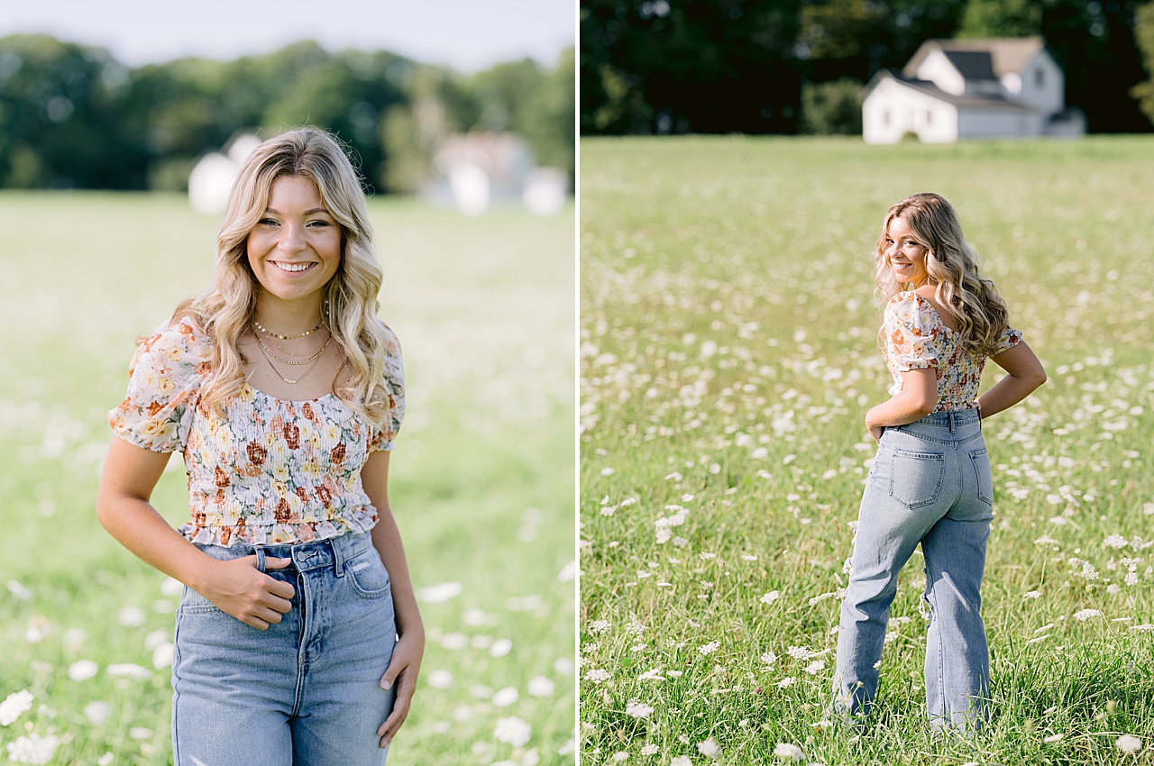 A girl walks through a field of white flowers in michigan