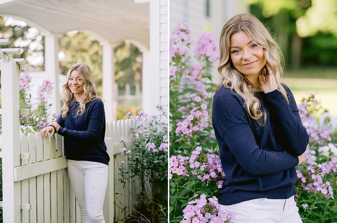 A high school senior smiles and laughs during a photo session in northern Michigan
