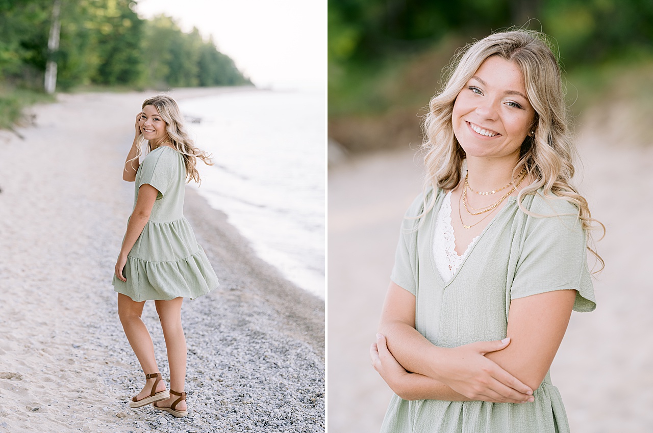 A high school girl walks down a rocky beach along Lake Michigan and looks over her shoulder