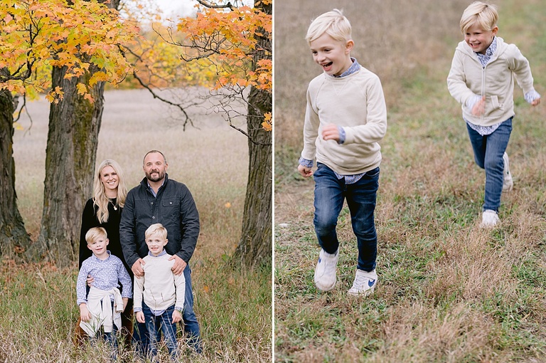 A family poses in the fall in a field of dry grass near petoskey michigan