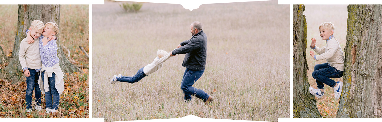 Two young brothers pose for michigan fall family portraits with their arms around each other's shoulders