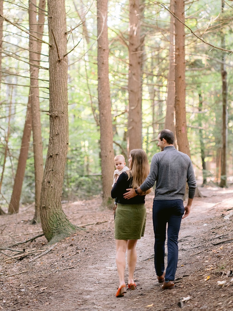 A family walking through a hemlock forest in Northern Michigan